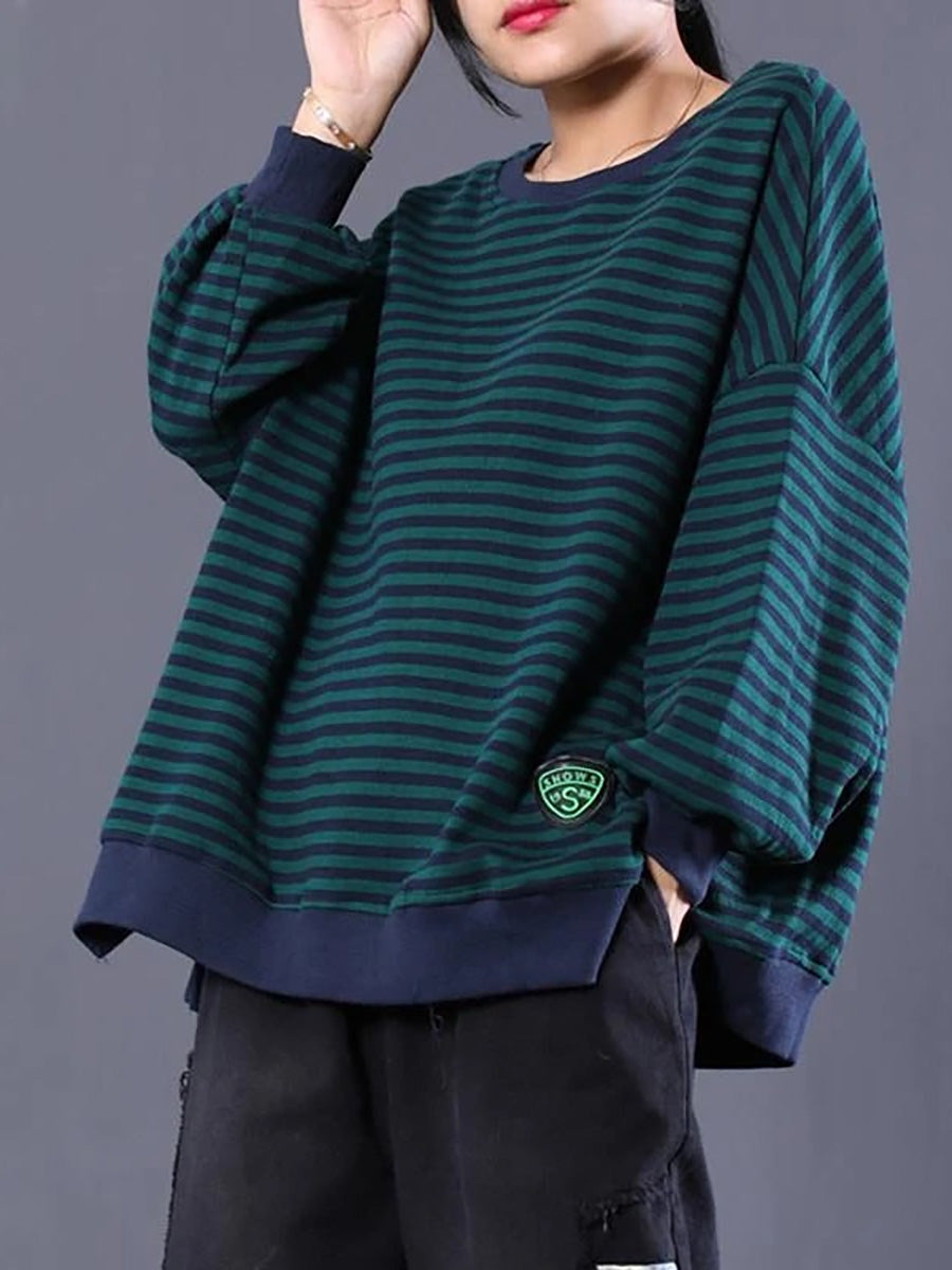 Buykud | Loose-fit green sweater with long sleeves and waist belt 0